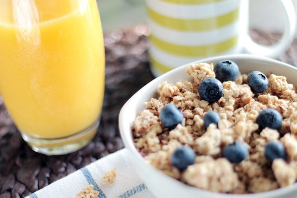 Nutritional Snacks to Eat with Orange Juice for Breakfast - oatmeal with fresh fruits